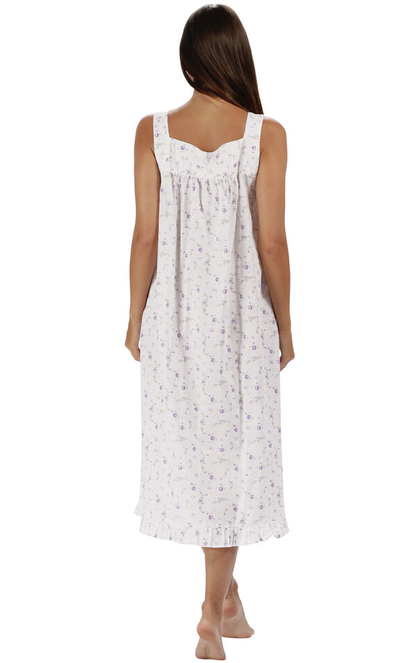 Model wearing Nancy Nightgown in Lilac Rose for Women, facing away from the camera