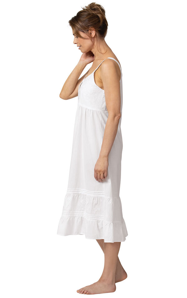 Model wearing Ruby Nightgown in White for Women, facing to the side